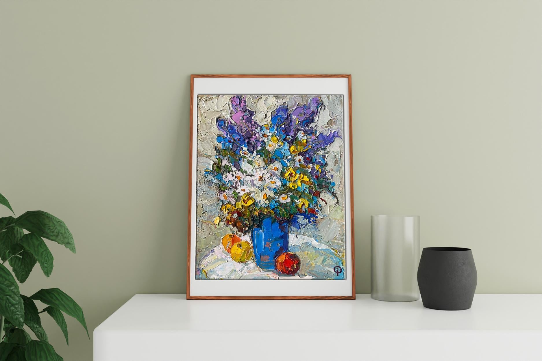 In oil, Oksana Ivanyuk illustrates a table adorned with flowers