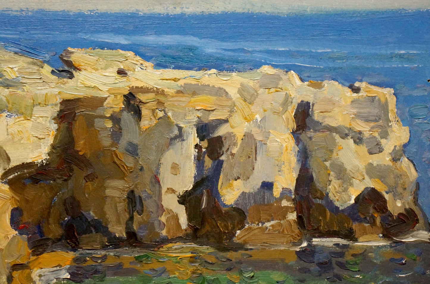 Within the oil painting, Yuri Alexandrovich Konovalov portrays a landscape adjacent to a cliff