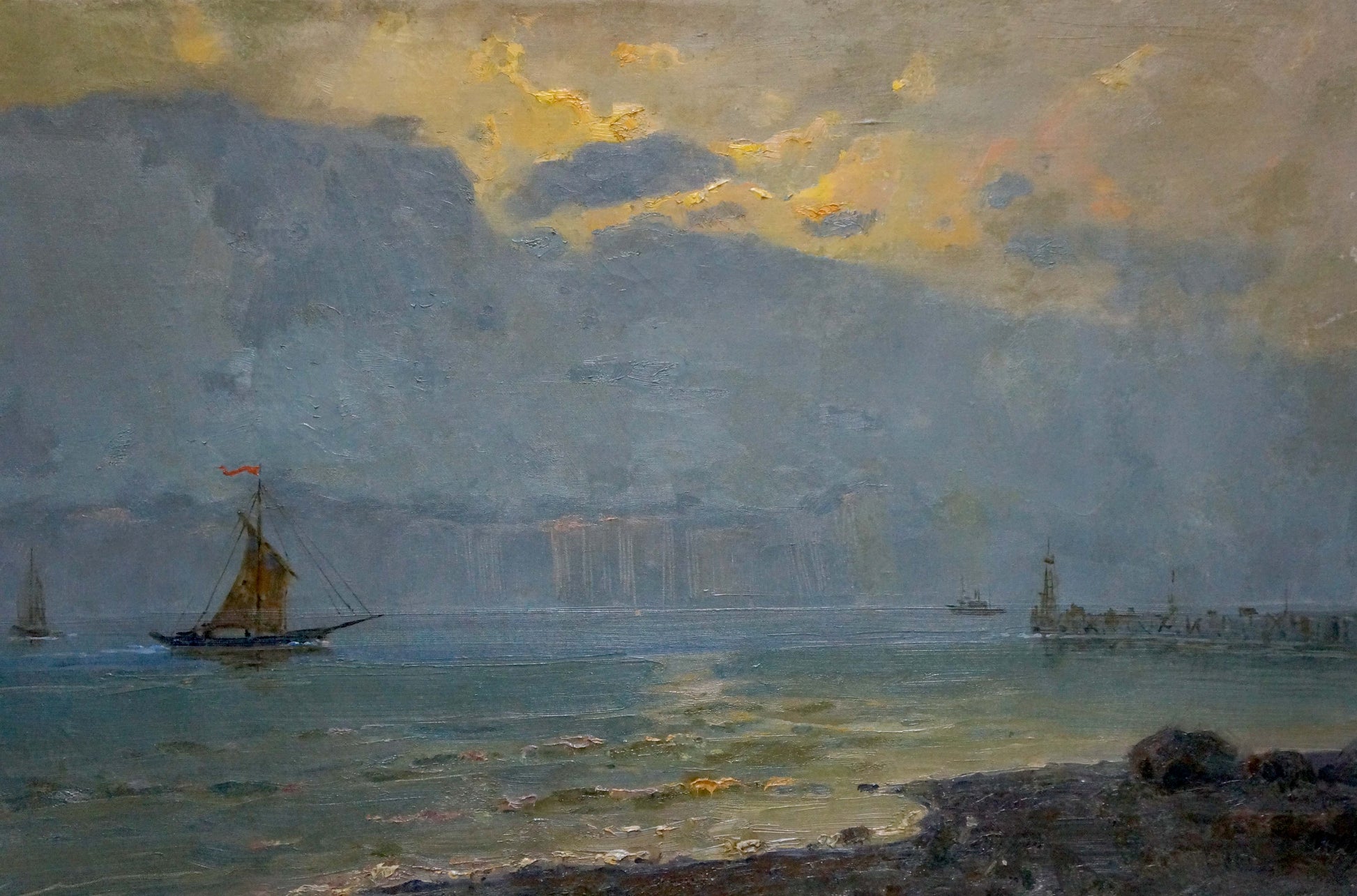 The artwork portrays ships on calm waters, the artist's name remaining a mystery