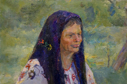 In oil, Odarka Anatoliivna Tytarenko portrays the likeness of a grandmother