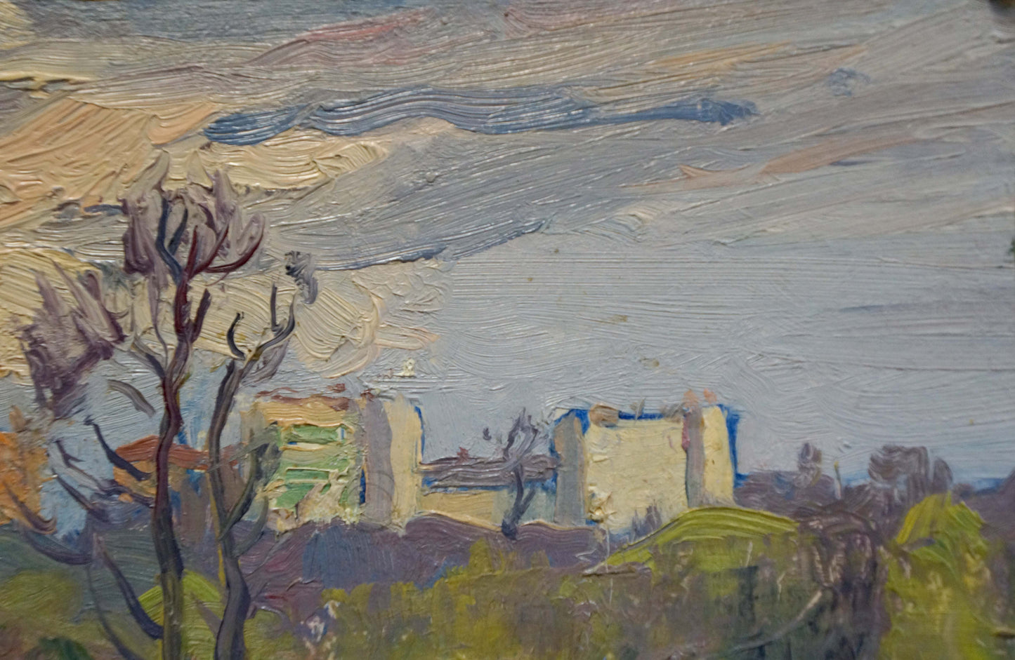 An oil artwork capturing a city view