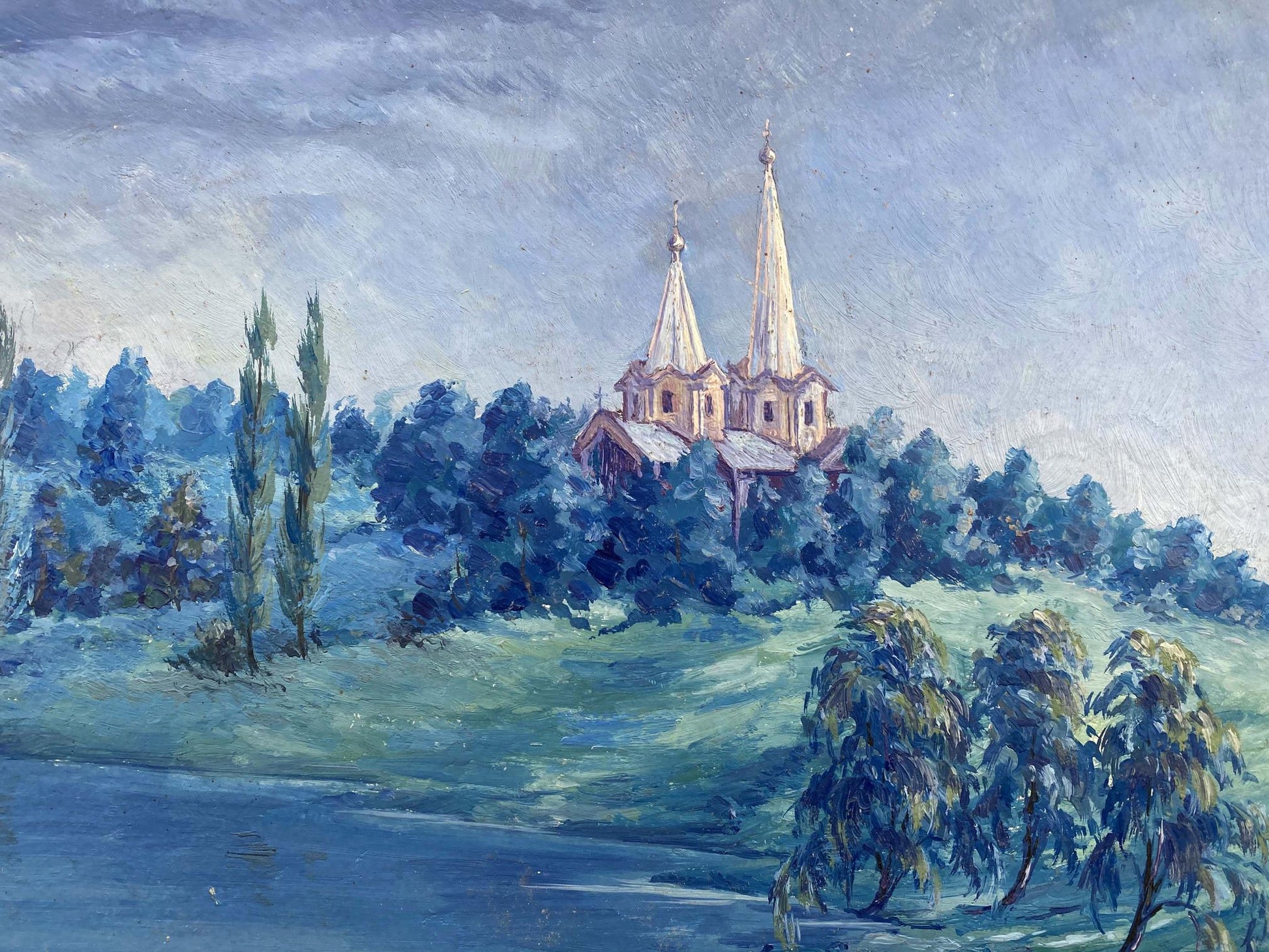 Alexander Vladimirovich Lesik's oil rendition captures a rainbow stretching over the church